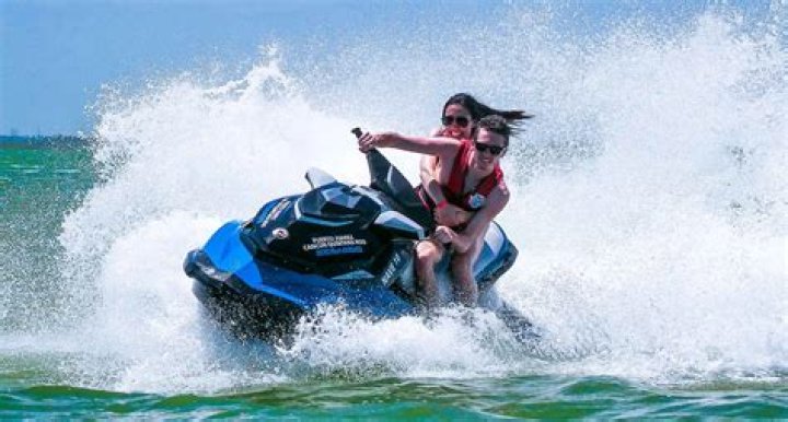 Simon Cowell, 61, Is All Smiles While Riding A Jet Ski Just 4 Mos. After Breaking Back In scary Accident